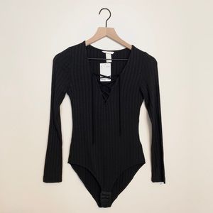 Ribbed lace-up long sleeved body suit